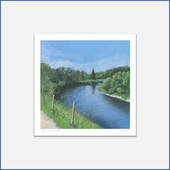 A mounted giclee print of a colourful acrylic painting of a walk by a blue Scottish river in Spring. Green trees and grass, a blue sky. A path leads us into the painting.