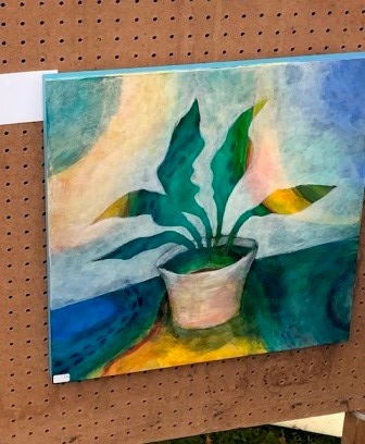 Colourful abstract acrylic painting by Judy Randle of a Peace Lily in shades of green, blue and yellow 